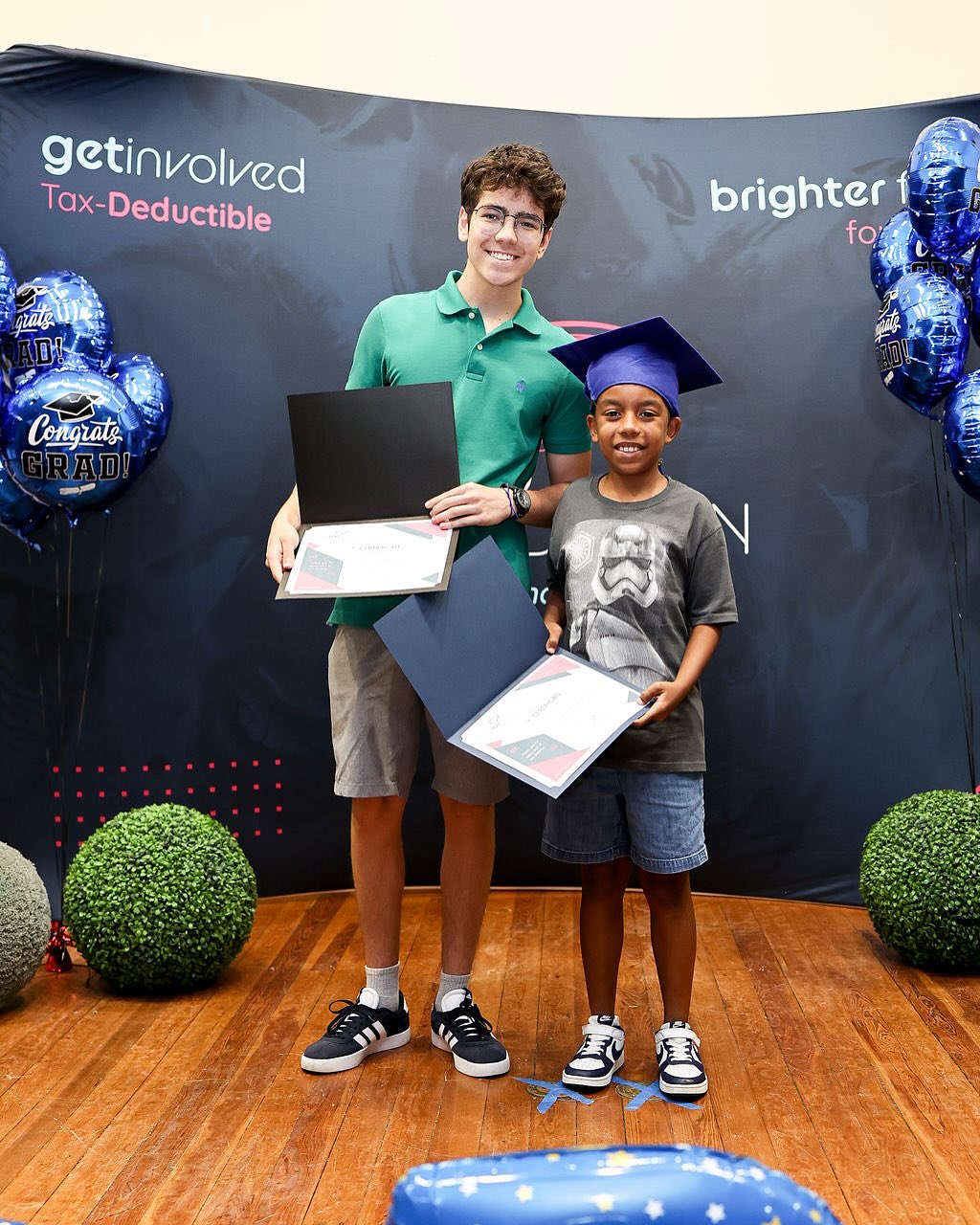 Pedro with Eduardo at the If You Foundation end-of-year recognition ceremony